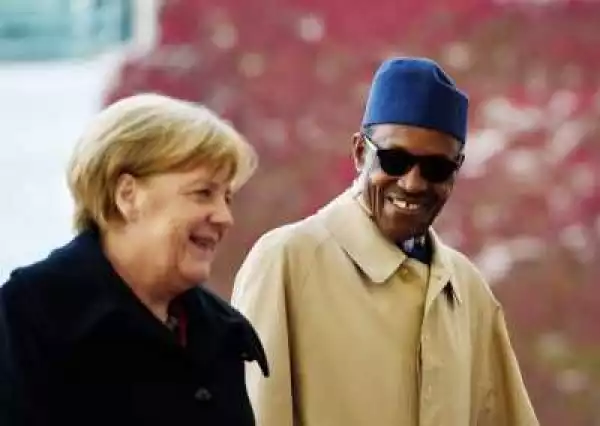 Photos Of Buhari & German Chancellor Angela Merkel Laughing Off Aisha’s BBC Interview